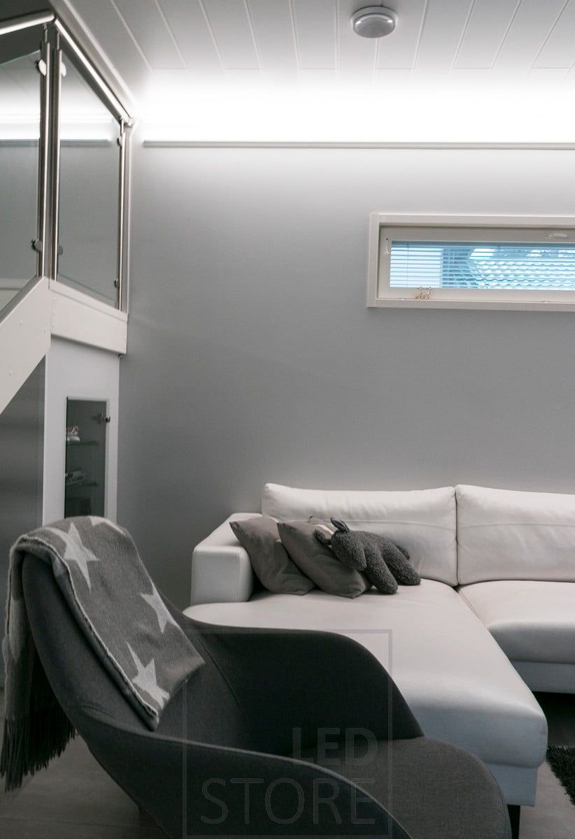Ceiling mounted led strip creating beautiful indirect light in your living room.